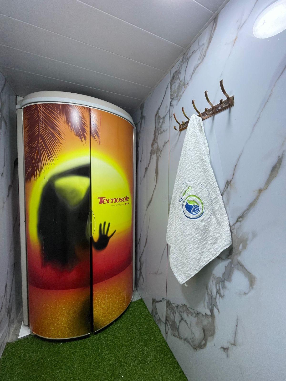 The Tecnosole solarium booth in its private room at Glow-Fit